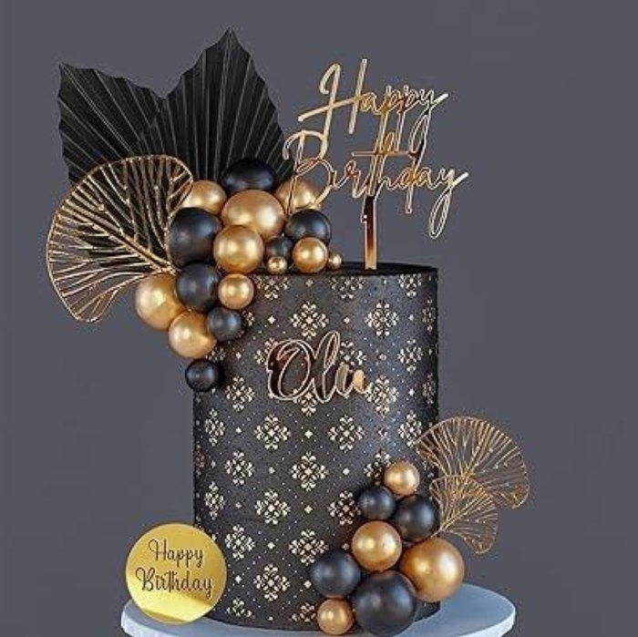 Black and gold birthday cake with laser cut Happy Birthday topper and name plaque