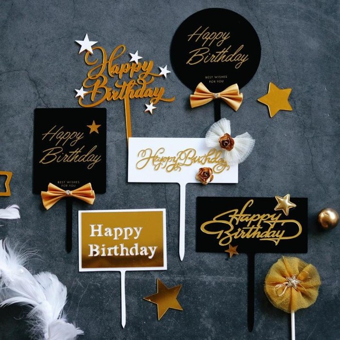 Assorted black and gold birthday laser cut cake toppers